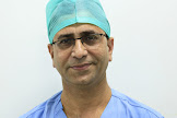 Dr. H K Dogra